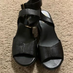 Black leather pumps. Size 9.5. Great with any outfit.